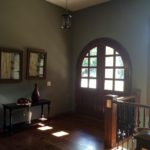 foyer with painted walls and sand swirl plaster ceiling